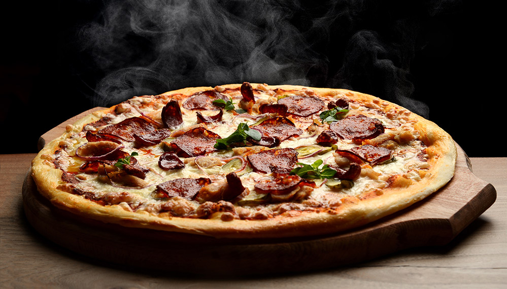 Steaming pizza